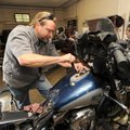 Bill Bryant, longtime motorcycle mechanic at Happy Trails Motorcycle Connection in Fayetteville, rep...