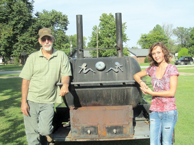 ricky-gilmore-is-shown-with-his-daughter-caitlin-ricky-is-a-multi-year-winner-of-jackson-countys-best-backyard-barbecue-contest-and-caitlin-is-a-winner-as-well-both-on-her-dads-team-and-alone