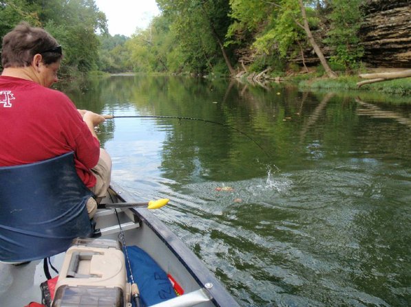 
                           Bland tussles with a War Eagle River smallmouth bass. The trip produced several smallmouths caught on tube baits and Zoom Tiny Brush Hogs.          