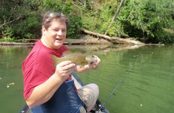 
                           Bland shows one of several smallmouth bass he caught on Friday, the last day of summer.        
