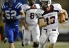 Will Whatley, the Springdale quarterback, scrambles for a first down on a keeper Sept. 21 during the second quarter of the Bulldogs’ game against Rogers at Mountie Stadium in Rogers.
