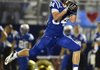 Zach Jones, a Rogers wide receiver, catches a 58-yard pass Sept. 21 from quarterback Nick Wary during the second quarter of the Mounties’ game against Springdale at Mountie Stadium in Rogers.
