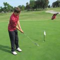 Matt McDonald, Springdale High golfer, practices putting Thursday at Springdale Country Club. McDona...