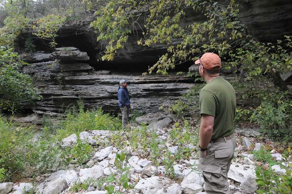 
                           Theo Witsell, left, and Mike Slay explore a bluff area.