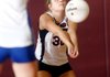 Anna Holcomb, a Springdale High senior, passes to a teammate during a match against Rogers High on Sept. 25 at Springdale.