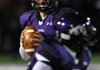 Austin Allen, Fayetteville’s starting quarterback, looks for an open receiver Friday against Rogers Heritage at Harmon Stadium in Fayetteville. 