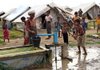 Muslim refugees pump water in Burma. Despised by many members of Burma’s Buddhist majority and denied citizenship, many of them are living in a tent city. 