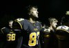 Landon Allen, Prairie Grove senior kicker, heads into the locker room Sept. 29 with his teammates at halftime against Farmington. 