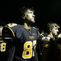 Landon Allen, Prairie Grove senior kicker, heads into the locker room Sept. 29 with his teammates at...