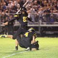 Allen prepares to kick a field goal during the second quarter of the game against Farmington. 