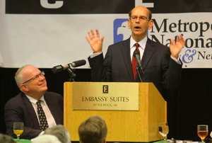 Talk-show host Paul Finebaum of Birmingham, Ala., speaks to the Little Rock Touchdown Club on Monday in Little Rock. Finebaum says the right coach can rejuvenate Arkansas’ football program. 