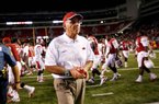 Arkansas Coach John L. Smith John L. Smith is 4-7 in first year at Arkansas and 136-93 in his 19th year overall.
