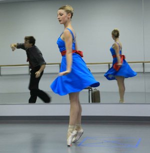 Toby Lewellen (reflected) and Amanda Sewell get the pointe of American Dream.