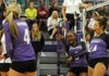 Phylicia Hill, second from right, of Fayetteville points out her teammate Aubrey Edie, left, in celebration after the team earned a kill against Springdale on Tuesday at Fayetteville.