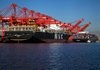 The MSC Beatrice, the largest container ship to make port in North America, is docked in the Port of Long Beach, Calif., earlier this month. The U.S. trade deficit widened in August to $44.2 billion, the Commerce Department said Thursday. 