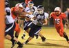 Greenwood running back Hoyt Smith (4) scores on his only carry, a 3-yard run in the first half, in the Bulldogs’ 55-14 victory over Little Rock Hall on Friday. 