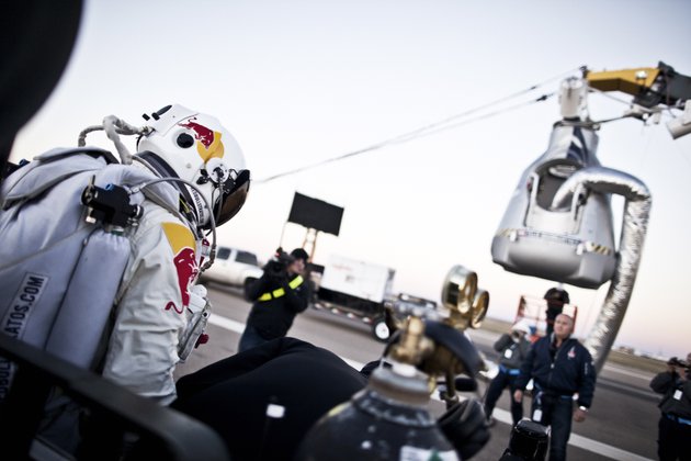 in-this-photo-provided-by-red-bull-pilot-felix-baumgartner-of-austria-steps-out-from-his-trailer-during-the-final-manned-flight-for-red-bull-stratos-in-roswell-nm-on-saturday-oct-14-2012-baumgartner-plans-to-jump-from-an-altitude-of-120000-feet-an-altitude-chosen-to-enable-him-to-achieve-mach-1-in-free-fall-which-would-deliver-scientific-data-to-the-aerospace-community-about-human-survival-from-high-altitudes