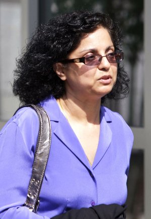 Sangeeta "Sue" Mann, walks to the Federal Courthouse in Little Rock, Ark., before a jury Monday, Aug. 9, 2010, convicted her husband Dr. Randeep Mann, 52, of using a weapon of mass destruction and destroying a vehicle with an explosive in the February 2009 attack that nearly killed the head of the state Medical Board. (AP Photo/Danny Johnston)