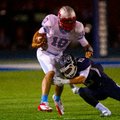 #10 QB Issac Jackson of Southside is tackled by #15 Drew Morgan of Greenwood during the first half.
