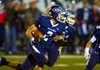 #2 Matt Sisco of Greenwood turns up field after picking off an interception during the first half.