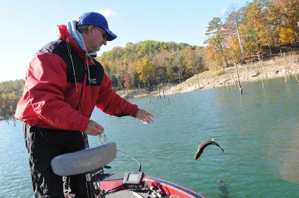 
                           Brashers releases a bass he caught in the Big Clifty arm of Beaver Lake with a War Eagle spinner bait.