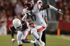 STAFF PHOTO ANTHONY REYES
Arkansas corner back Will Hines (9) slips as Rutgers wide receiver Brandon Coleman (17) sprints for a third quarter touchdown Saturday, Sept. 22, 2012 at Razorback Stadium in Fayetteville.