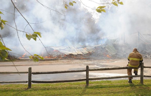 
                               
                                  Photo by Samantha Baker&mdash;
                               
                           
                           Firefighters burn Lakeside Restaurant Friday, Oct. 26, 2012, at Lake Atalanta in Rogers during a training exercise for the Rogers Fire Department and their Rookie Training Academy.