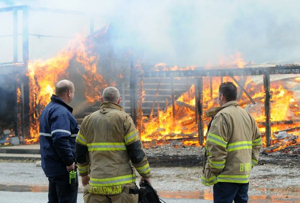 
                               
                                  Photo by Samantha Baker&mdash;
                               
                           
                           Firefighters burn Lakeside Restaurant Friday, Oct. 26, 2012, at Lake Atalanta in Rogers during a training exercise for the Rogers Fire Department and their Rookie Training Academy.
