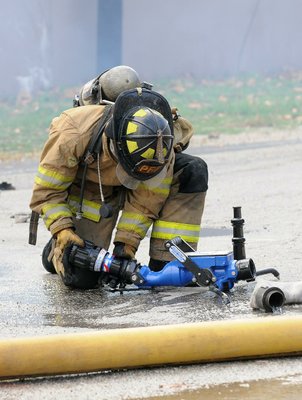 
                               
                                  Photo by Samantha Baker&mdash;
                               
                           
                           Firefighters burn Lakeside Restaurant Friday, Oct. 26, 2012, at Lake Atalanta in Rogers during a training exercise for the Rogers Fire Department and their Rookie Training Academy.