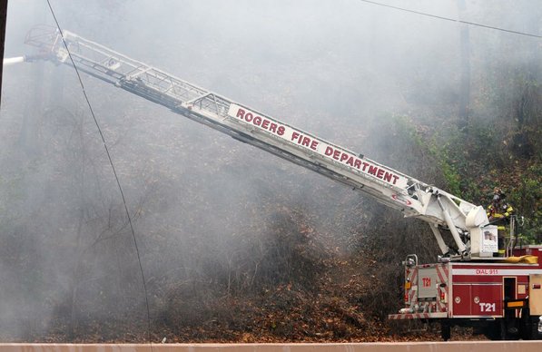 
                               
                                  Photo by Samantha Baker&mdash;
                               
                           
                           Firefighters burn Lakeside Restaurant Friday, Oct. 26, 2012, at Lake Atalanta in Rogers during a training exercise for the Rogers Fire Department and their Rookie Training Academy.