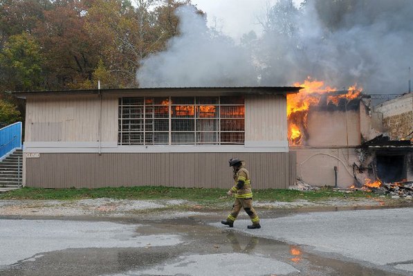 
                               
                                  Photo by Samantha Baker&mdash;
                               
                           
                           Firefighters burn Lakeside Restaurant Friday, Oct. 26, 2012, at Lake Atalanta in Rogers during a training exercise for the Rogers Fire Department and their Rookie Training Academy.