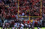 Ole Miss kicker Bryson Rose (81) makes a 31-yard field goal as time runs out, giving the Rebels a 30-27 victory over Arkansas on Saturday at War Memorial Stadium. The Razorbacks had tied the game, 27-27, with 2:09 left on a 5-yard run by Dennis Johnson.