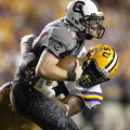 LSU defensive end Sam Montgomery sacks South Carolina quarterback Connor Shaw (14) during the second...