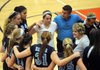 Sandy Jones, the Springdale Har-Ber head coach, rallies her team Wednesday during a timeout against Conway at the 7A State Volleyball Tournament at Rogers Heritage in Rogers. 