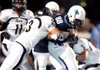Bentonville linebacker Garrett Kaufman (33), tackling Springdale Har-Ber wide receiver Miguel Salgado on Sept. 21, has a team-high 77 tackles, including 54 unassisted. He also has three pass breakups and returned an interception for a touchdown. 