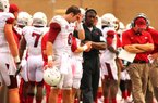 Arkansas quarterback Tyler Wilson (8) and offensive coordinator Paul Petrino (right) lament missed opportunities by the Razorbacks’ offense in a 58-10 loss to Texas A&M in September. Arkansas is averaging 27 points a game, its lowest total since 2008.