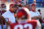 Arkansas offensive coordinator Paul Petrino (right) told the Northwest Arkansas Touchdown Club on Wednesday that coaches had told game officials during the Ole Miss game that the Razorbacks would be running a play where they would move a lineman out on the field. Despite the advance warning, Arkansas was penalized on the play, which negated a touchdown pass to Austin Tate. 