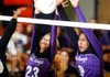 Fayetteville junior Cassidy Ginger (left) and senior Mikayla Avery attempt to block a Bentonville shot during their Class 7A semifinal match Thursday at Rogers Heritage High School. 