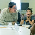 Austin Carroll, left, and Braxton Bowen from Hellstern Middle School in Springdale react Thursday wi...