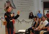 Retired U.S. Marine Cpl. Aaron Mankin emphasizes the importance of Veterans Day during the Westside Elementary Veterans Day ceremony on Friday.