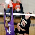 Hailey McNee, Bentonville senior, tries to send a shot past Fayetteville senior Aubrey Edie during t...