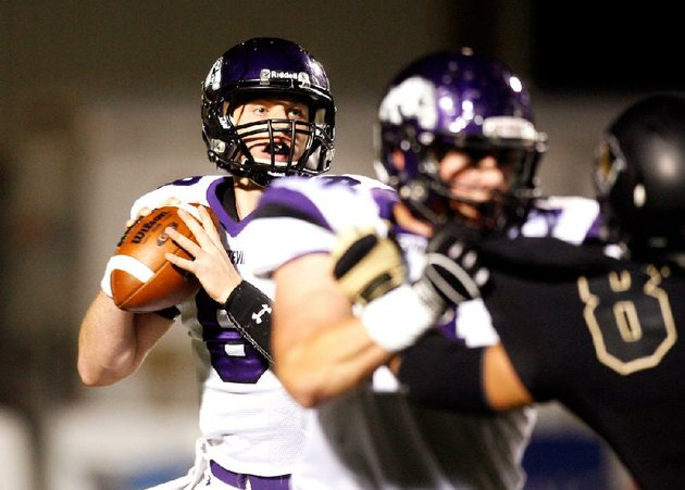 fayetteville-quarterback-austin-allen-looks-for-a-receiver-in-the-first-half-of-a-24-17-loss-to-top-ranked-bentonville-on-friday-at-tiger-stadium-in-bentonville-allen-threw-for-194-yards
