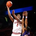 NWA Media/JASON IVESTER -- Arkansas junior Coty Clarke attempts a hook shot over LeMoyne-Owen junior...