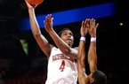NWA Media/JASON IVESTER -- Arkansas junior Coty Clarke attempts a hook shot over LeMoyne-Owen junior Victor Shell during the first half on Monday, Nov. 5, 2012, at Bud Walton Arena in Fayetteville.