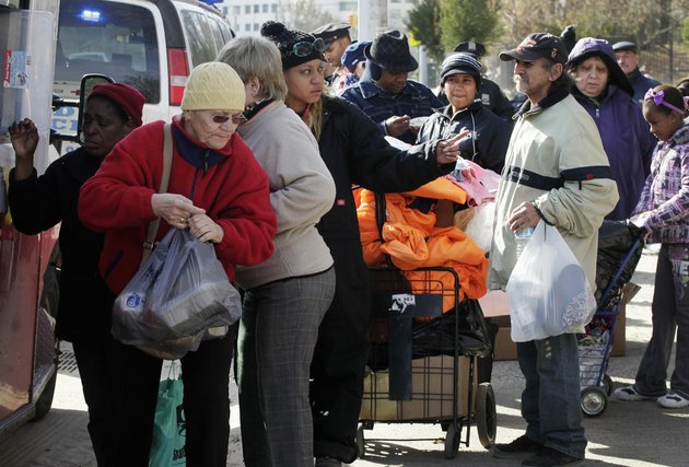 residents-line-up-for-bundles-of-food-at-an-american-red-cross-station-in-the-coney-island-section-of-brooklyn-monday-nov-5-2012-in-new-york-the-region-is-still-cleaning-up-a-week-after-superstorm-sandy