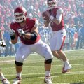 Arkansas quarterback Tyler Wilson (8) completed 21 of 31 passes for 272 yards in Saturday’s 19-15 vi...