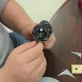 Duncian Kiesel, a ninth-grader creates a rose with duct tape Monday. 