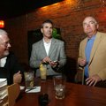 Patric Brosh, from left, Marshall Ney and Jay Allen, all with Keep Dollars in Benton County, sit aro...