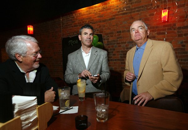patric-brosh-from-left-marshall-ney-and-jay-allen-all-with-keep-dollars-in-benton-county-sit-around-the-bar-at-table-mesa-bistro-in-bentonville-on-tuesday-while-watching-voting-results-the-keep-dollars-in-benton-county-group-helped-get-the-issue-on-the-ballot-to-legalize-retail-alcohol-sales-in-benton-county