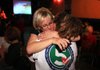 Arkansas Democrat-Gazette/RICK MCFARLAND --11/06/12-- Melissa Fults (facing) hugs Aubrey Buchanan at the watch party for the group supporting the medical marijuana act. Fults is the spokeperson and treasurer with Arkansas for Compassionate Care. The party was at Vino's restaurant in Little Rock Tuesday. 